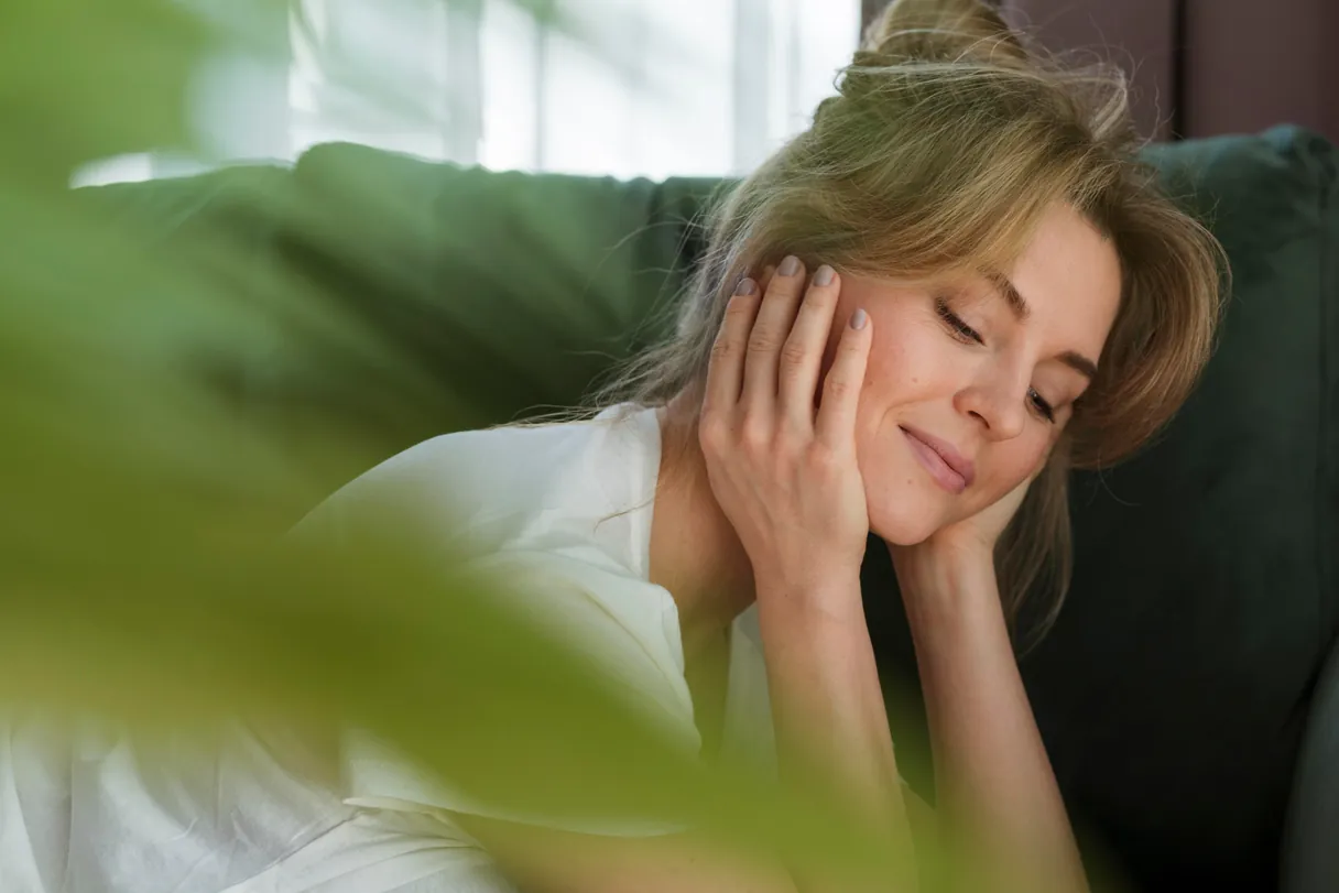Woman with smooth, glowing skin after a skin and laser treatment
