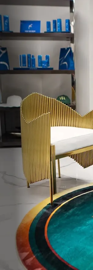 VIA Health & Medspa reception area with gold accents